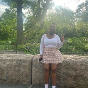 I’m selling a light pink flared skirt from Shein.